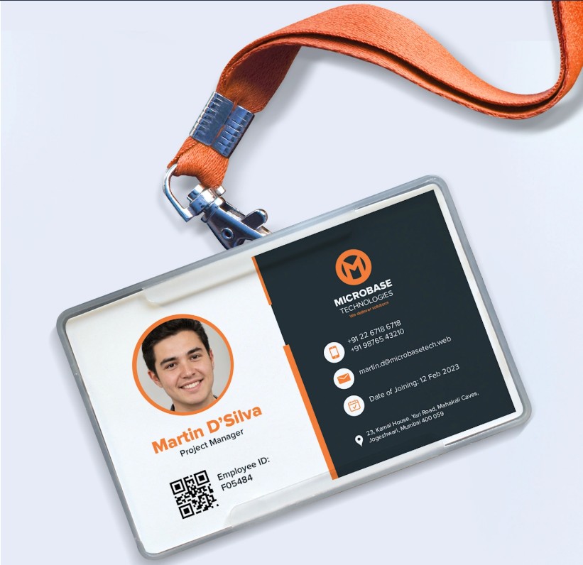 Sample orange-themed employee ID card with woven lanyard — Chrisans Solutions PVC ID card sample
